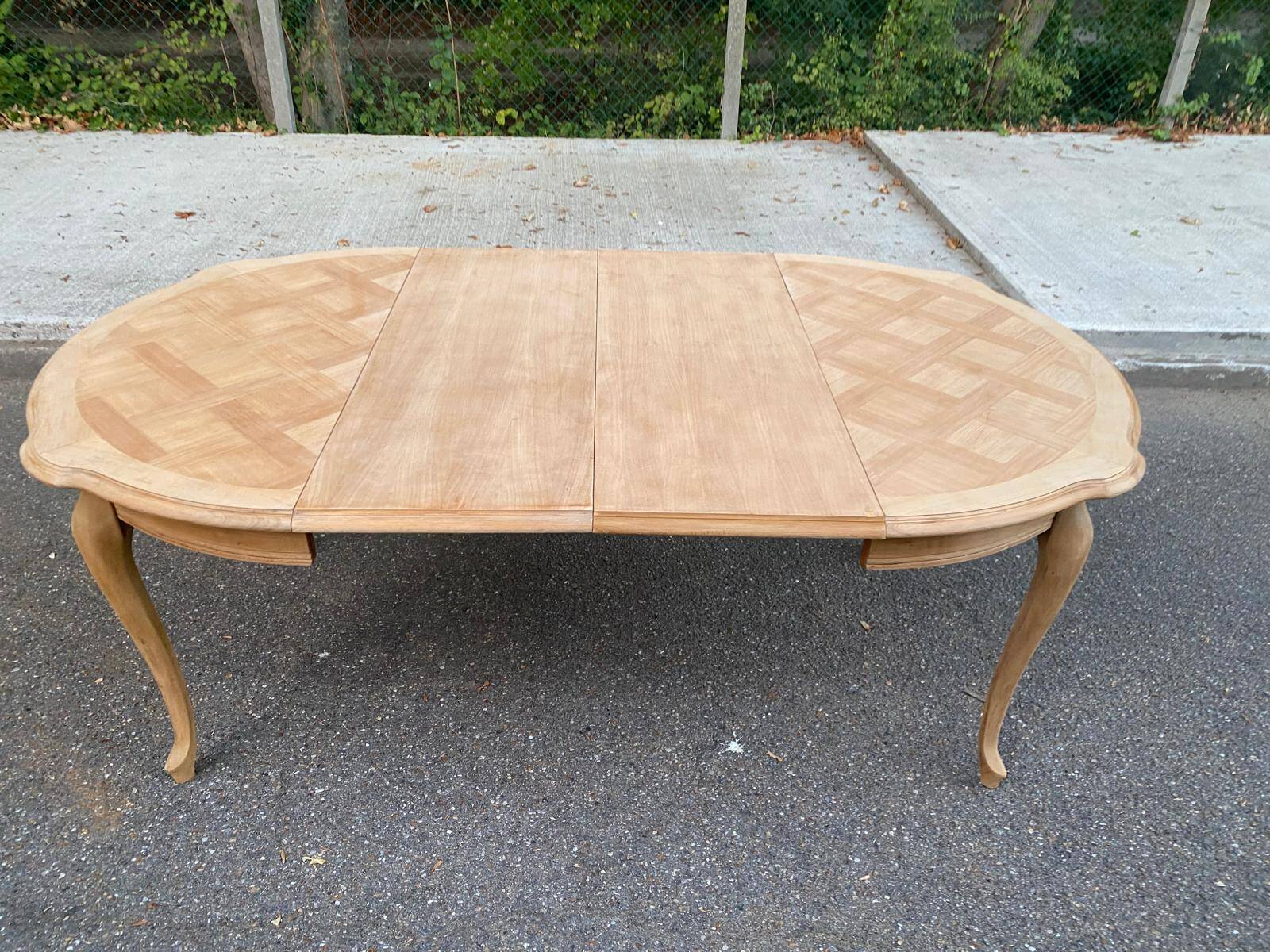Round extendable dining table Louis XV stripped in solid cherry wood 1960
