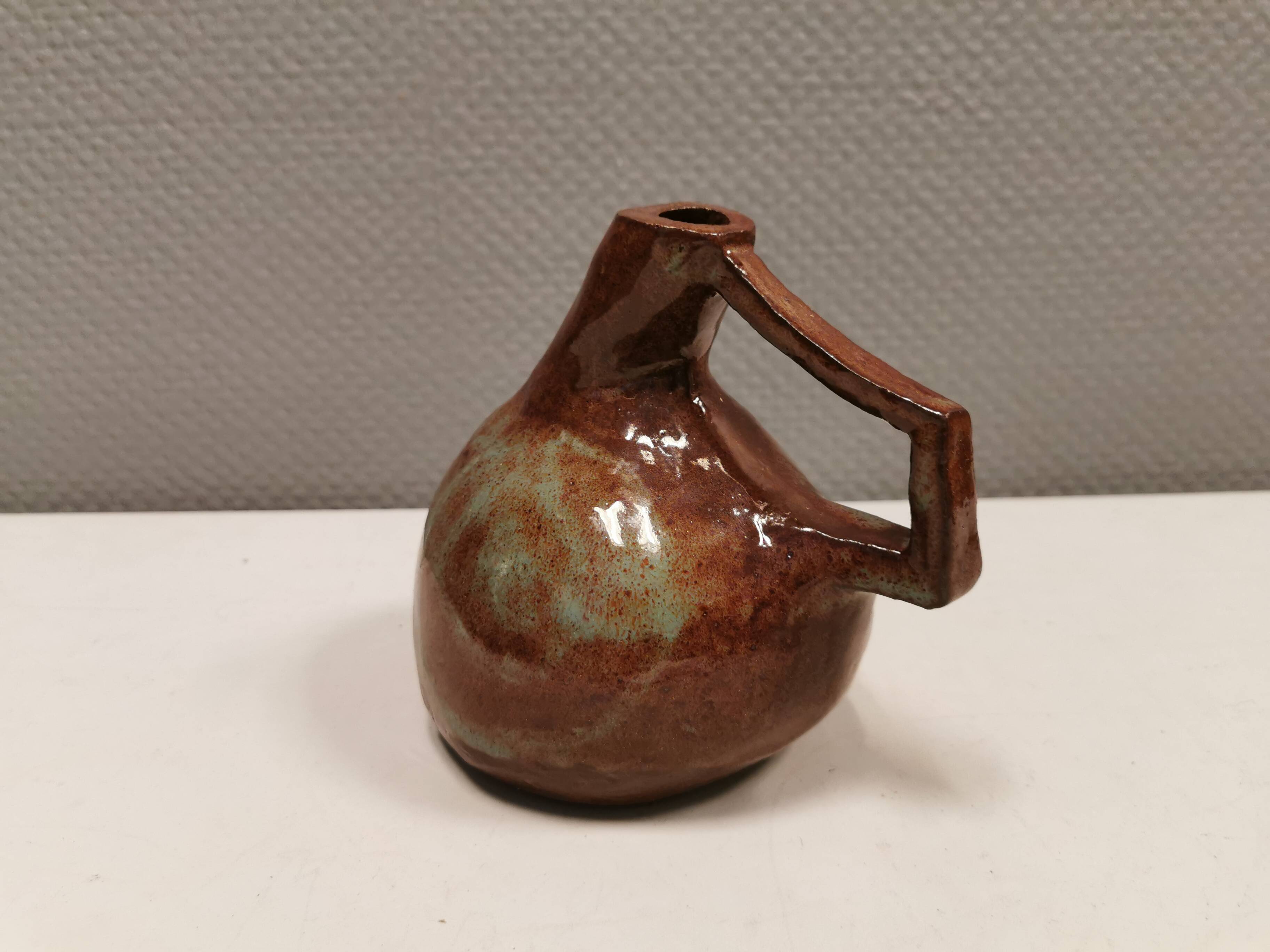 Ceramic jug/vase, Danish in beautiful earthy brown colours with light blue/green details.