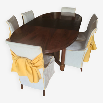 table originale  avec rallonge escamotable et 6 chaises