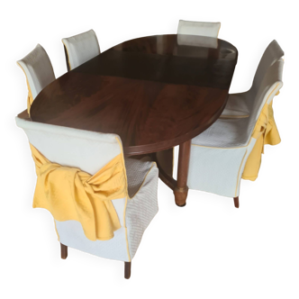 table originale  avec rallonge escamotable et 6 chaises
