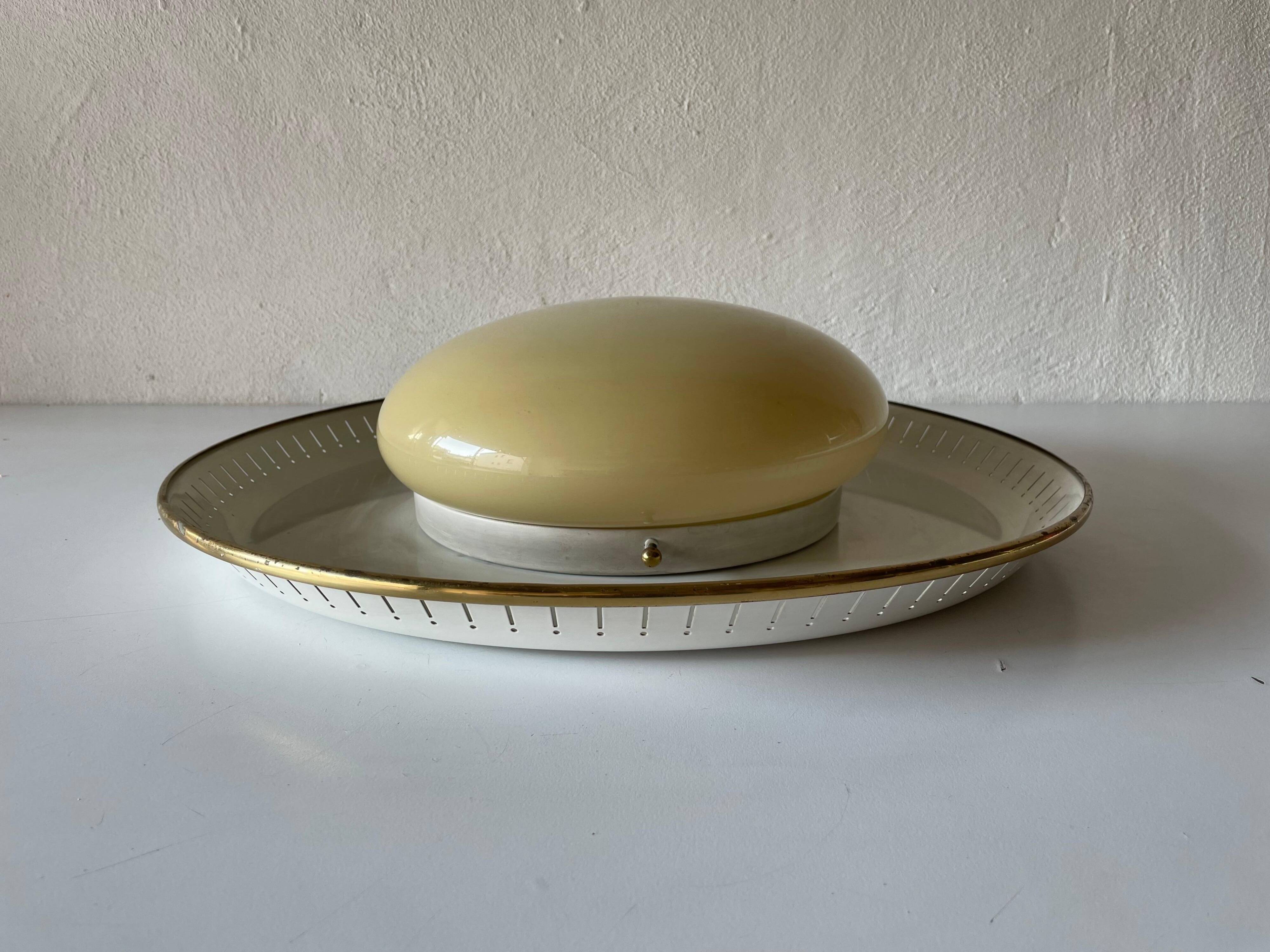 Brass disc and glass clip lamp from the mid-century by Hillebrand, 1950s, Germany.