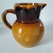 Glazed earthenware jug