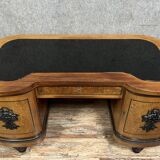 Curved Art Deco period center desk in clear magnifying glass and black lacquer circa 1925