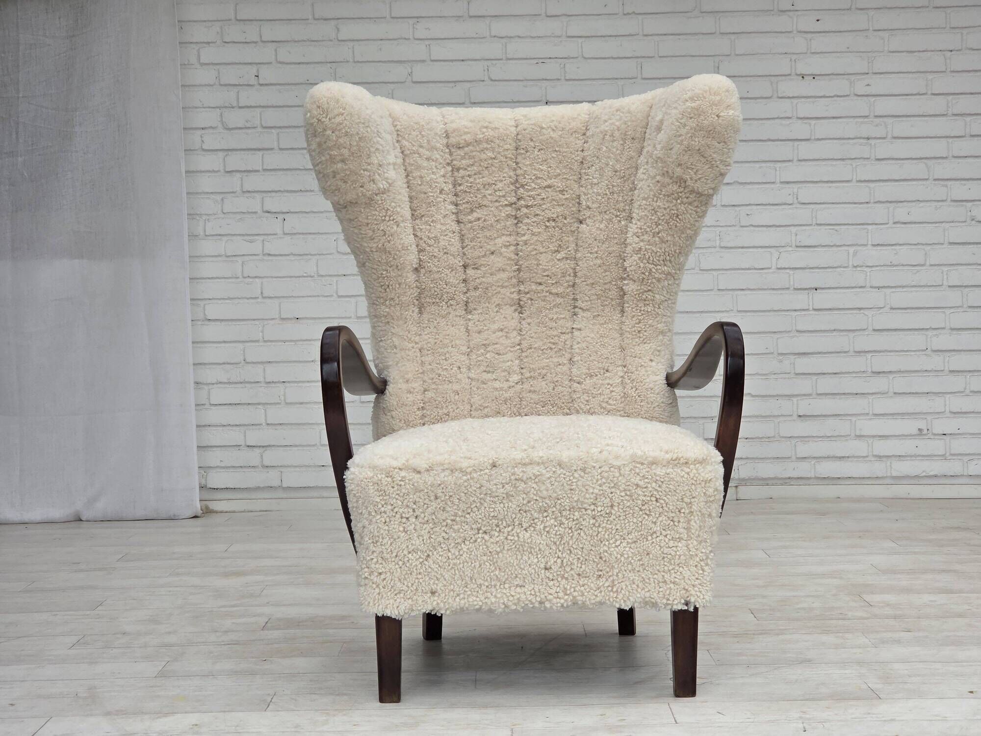1960s, Danish high-back armchair, genuine sheepskin, reupholstered.