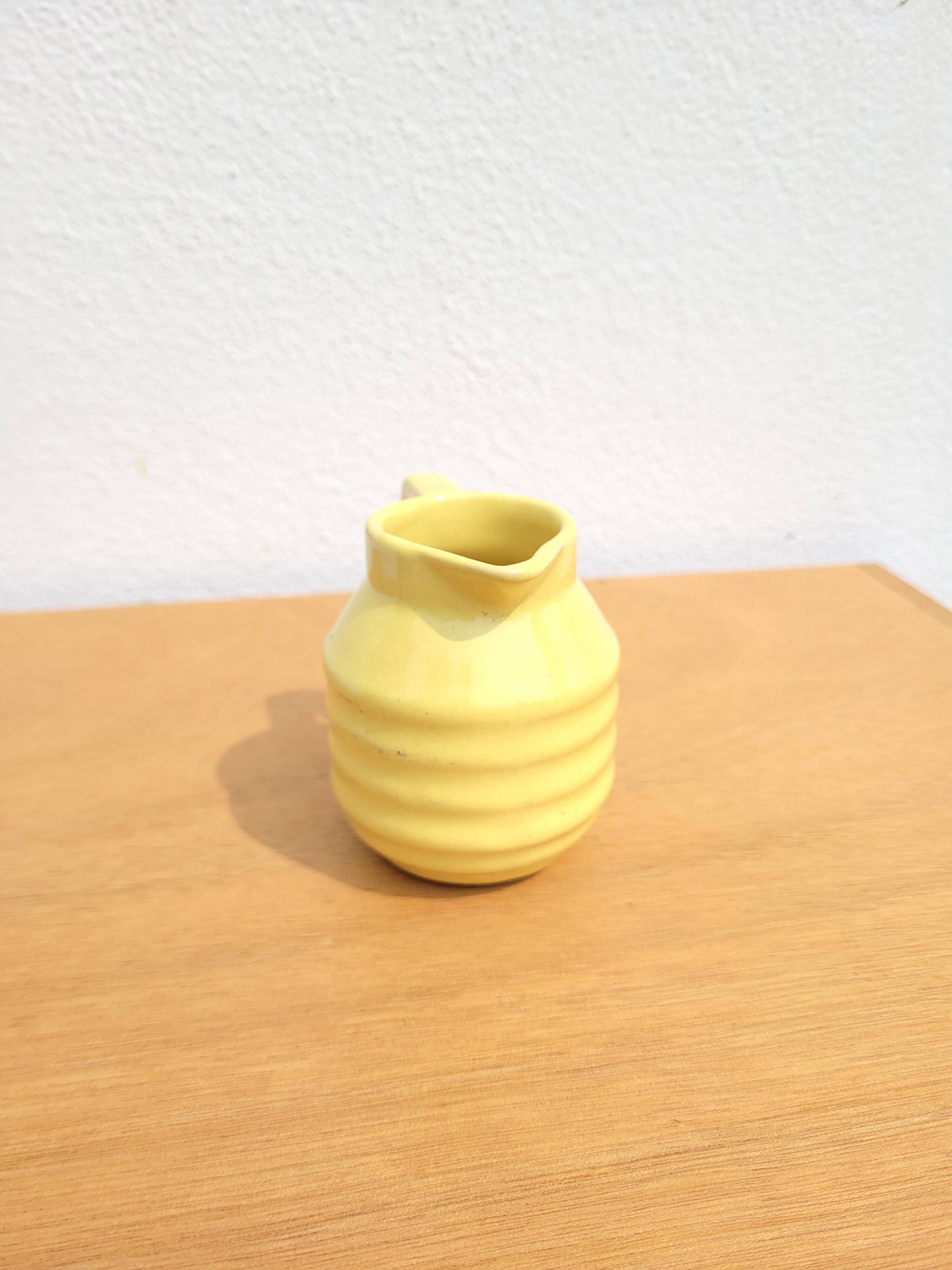 Small yellow milk jug Onnaing circa 1930