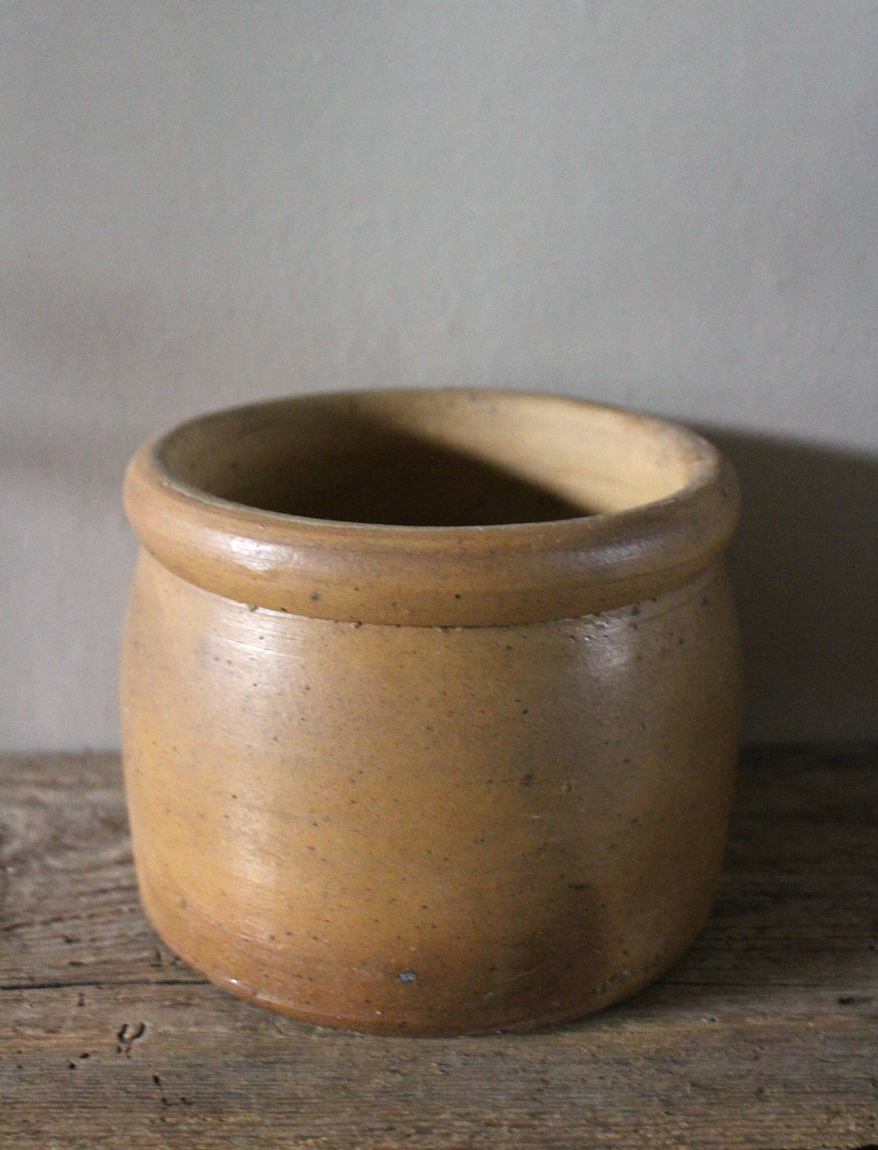 Round terracotta milk jug with handle