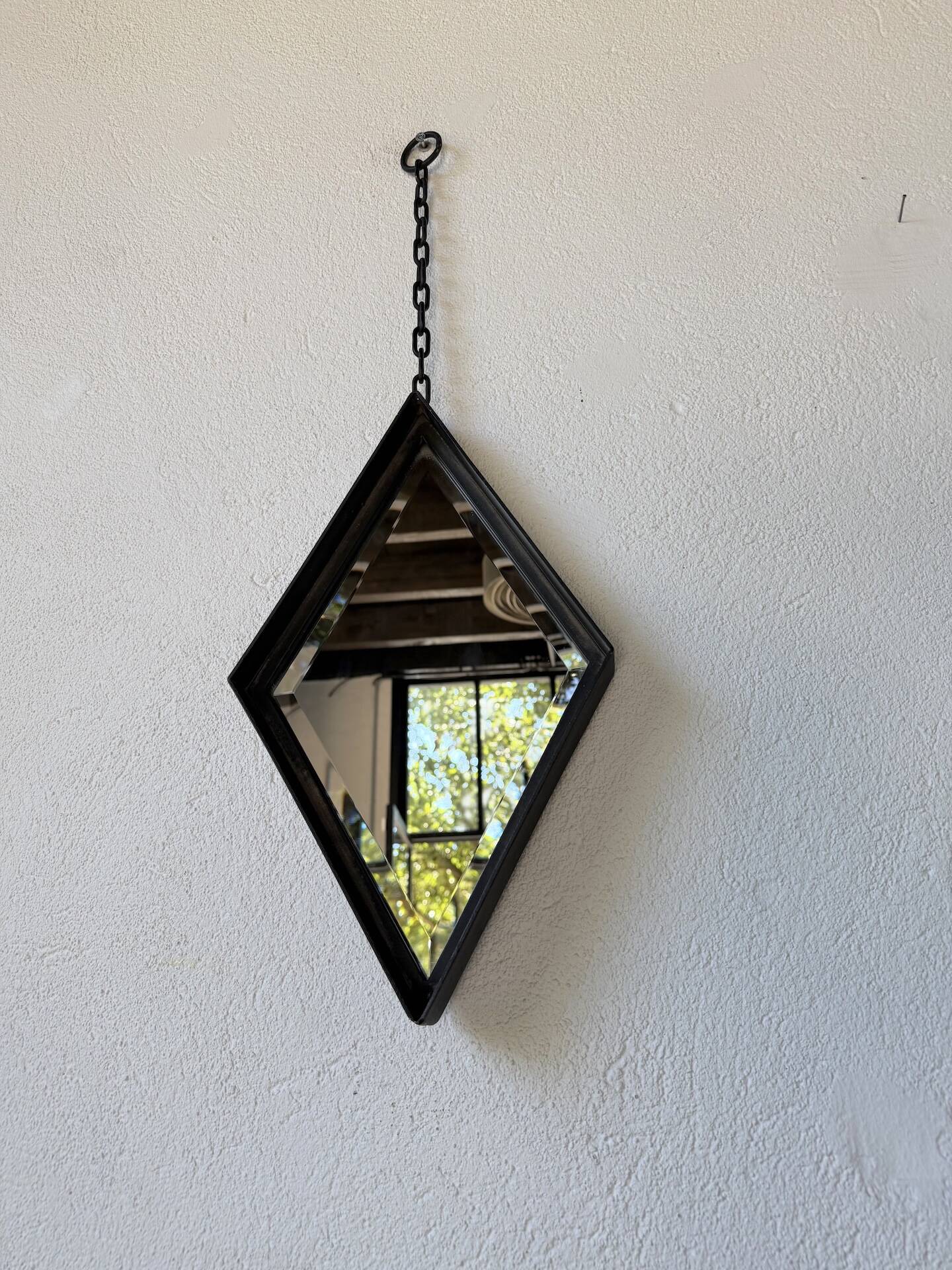 Miroir brutaliste losange en fer