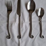 Twisted metal cutlery with a fancy spiral design.