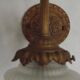 French Art Nouveau wall sconce in bronze with a white and pink glass shade.