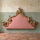 Italian rococo-style headboard in carved gilded wood, 19th century.