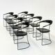 Ensemble de 8 chaises de salle à manger vintage Arrben Ursala en cuir noir.