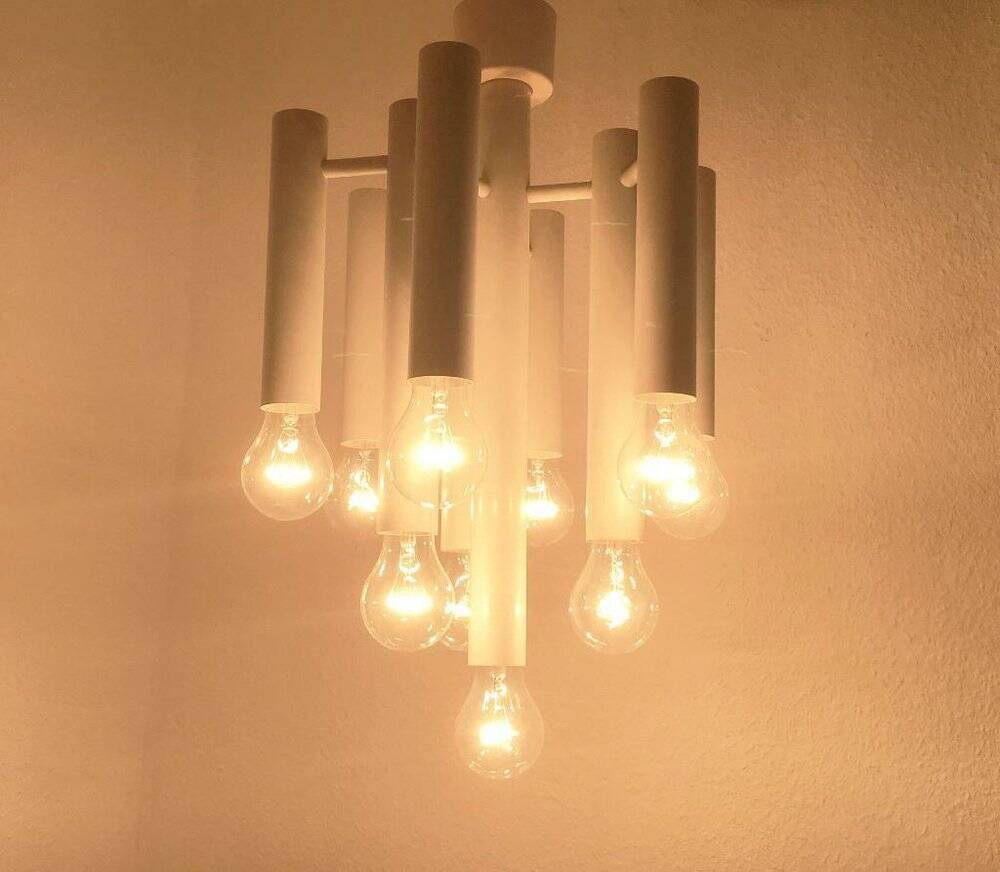 Minimalist suspension from the Swiss space age of the mid-century type 415 by Temde, 1960s.