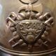 Casque pompier ancien en laiton