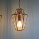 Pair of brass and bevelled glass pendant lights/lanterns, 1950-60.