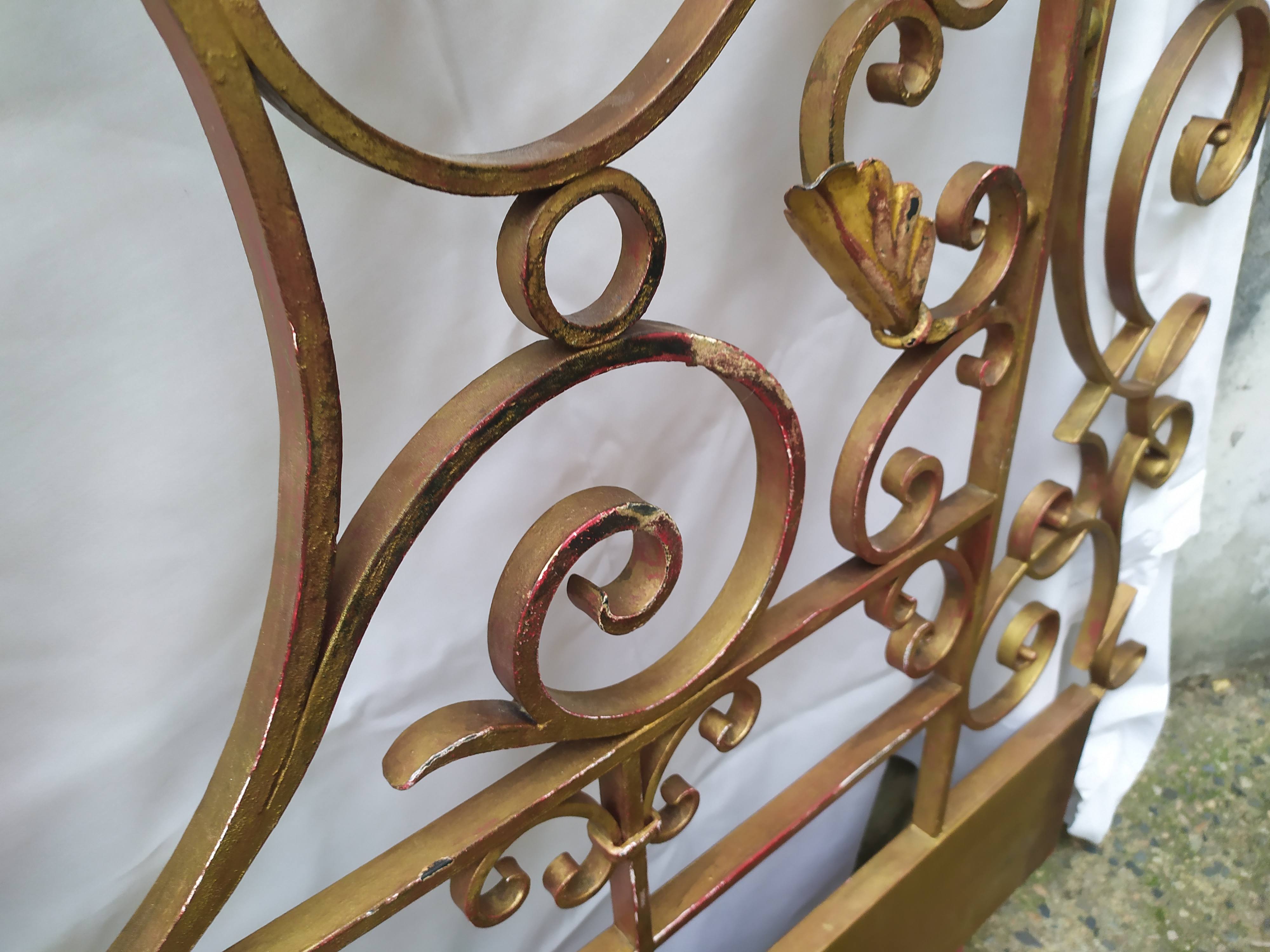 Golden wrought iron bedhead