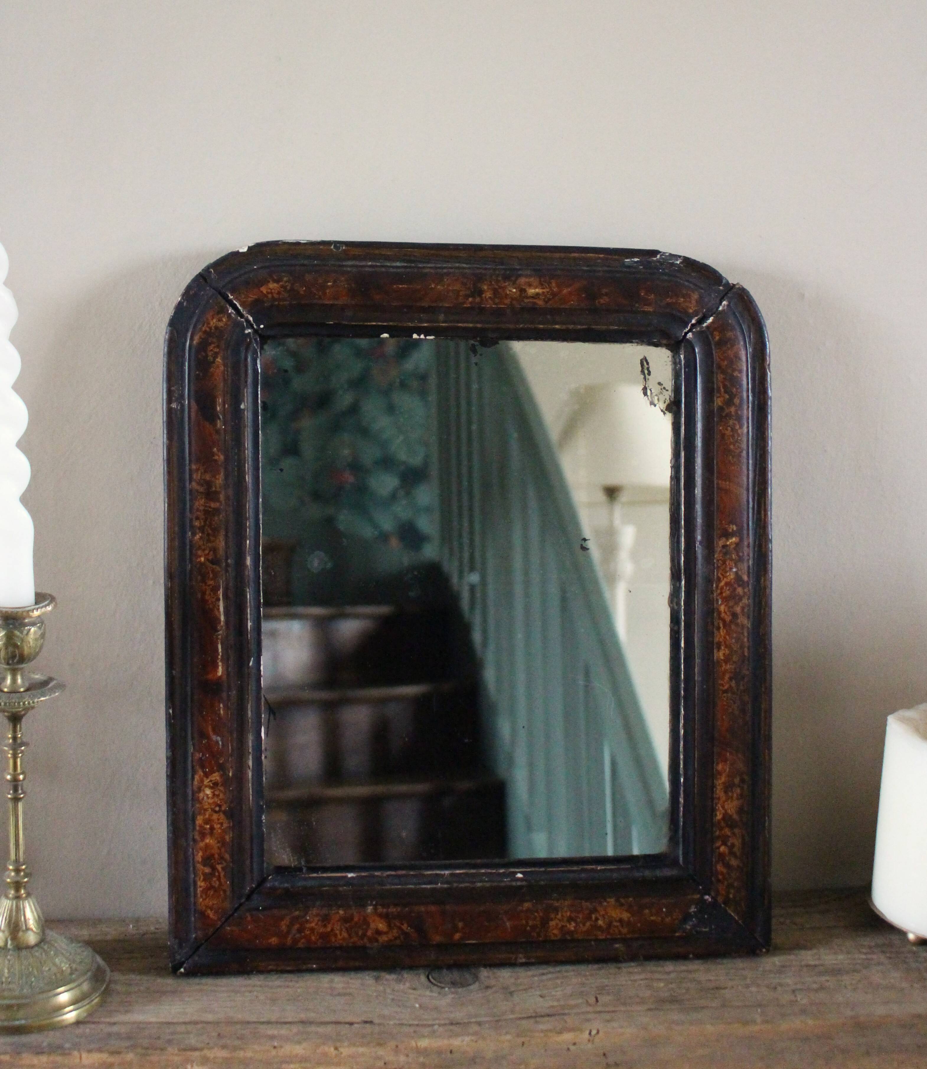 Antique Louis Philippe mirror in black and brown.