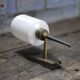 Brass wall light, black lacquered metal and white opal glass, 50s.