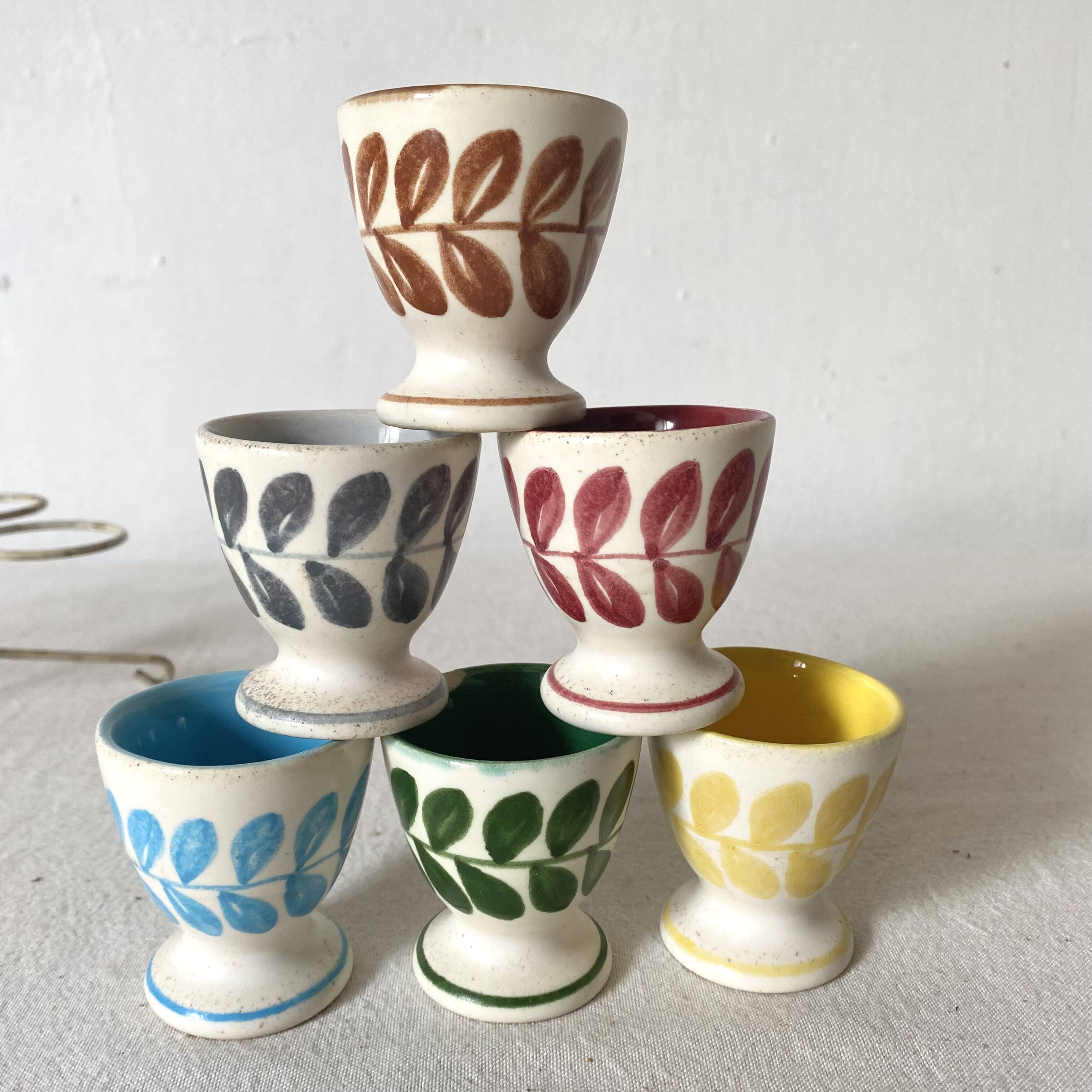 Antique earthenware egg cups