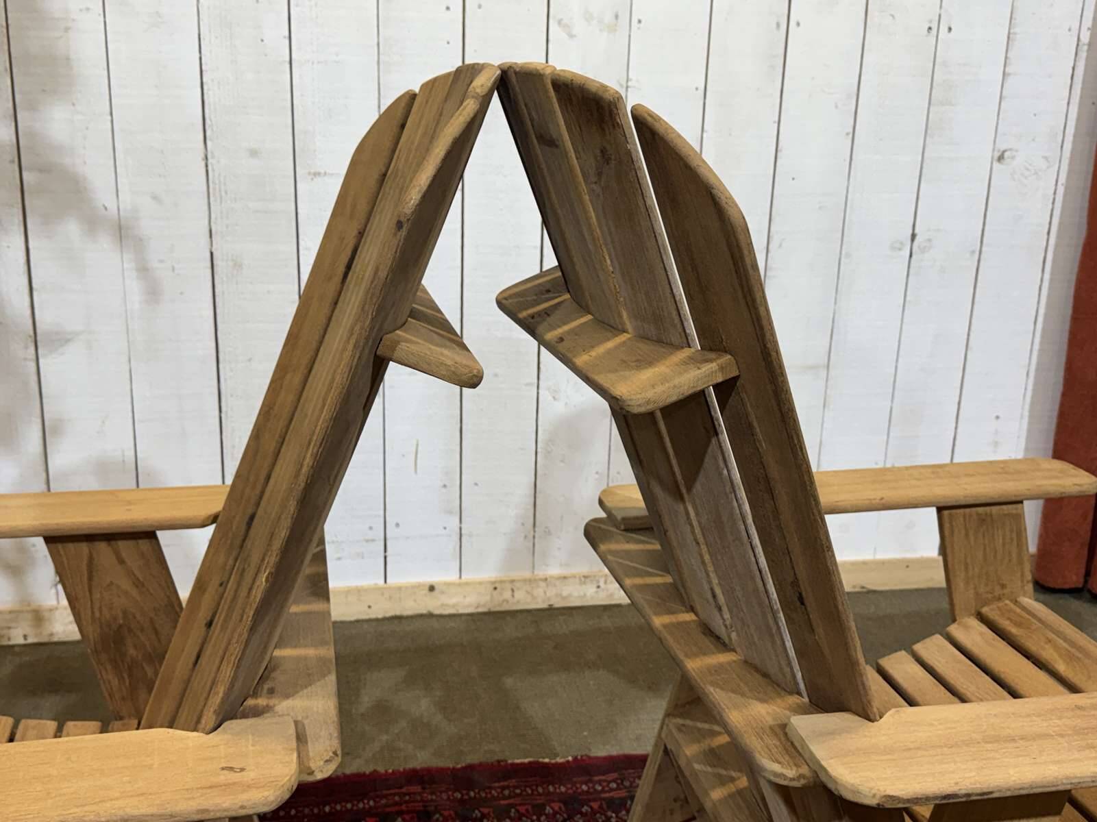Pair of Indian teak armchairs