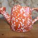 Ceramic watering can