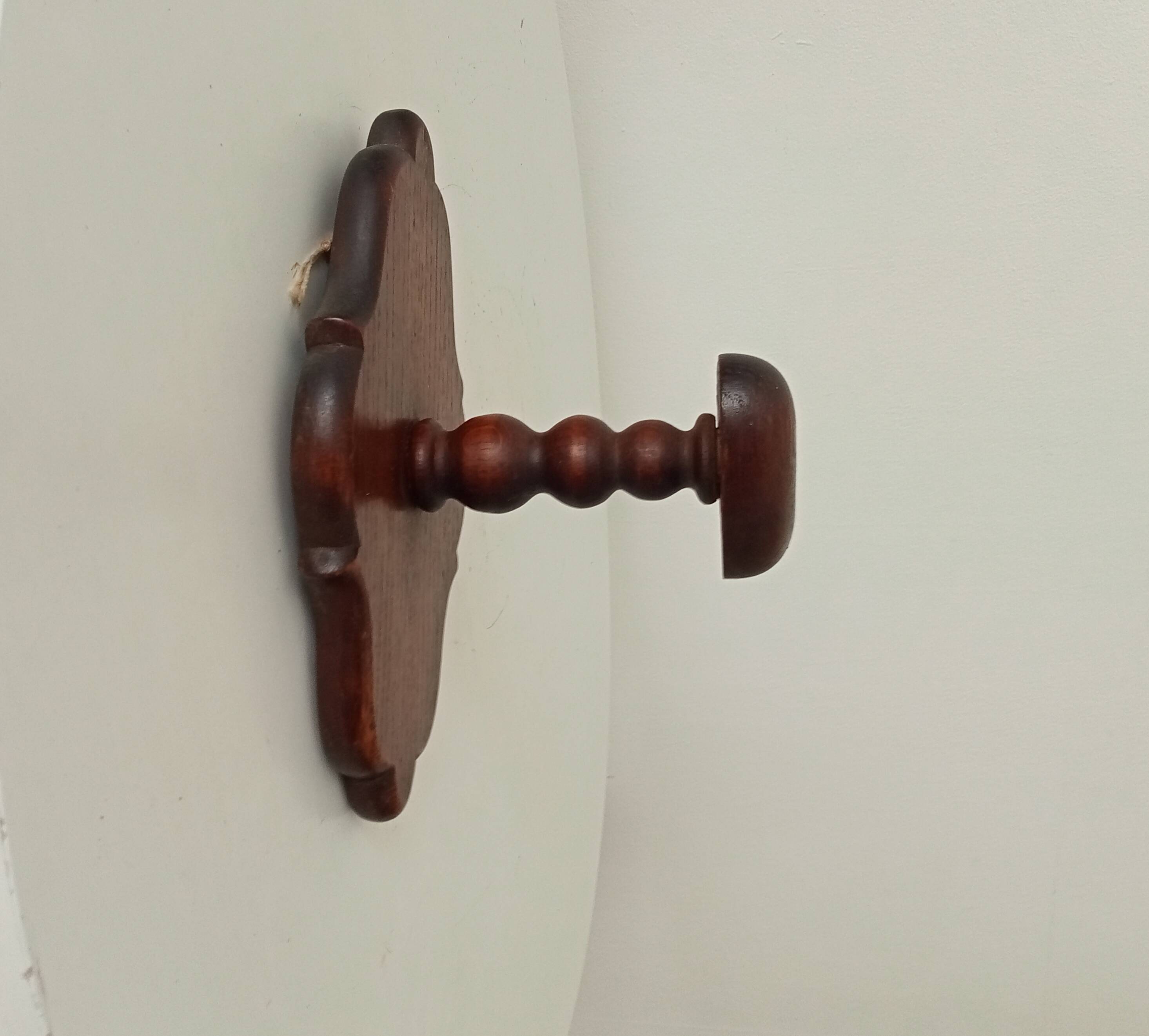 Vintage wall coat rack in carved solid wood, popular art.