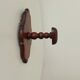 Vintage wall coat rack in carved solid wood, popular art.