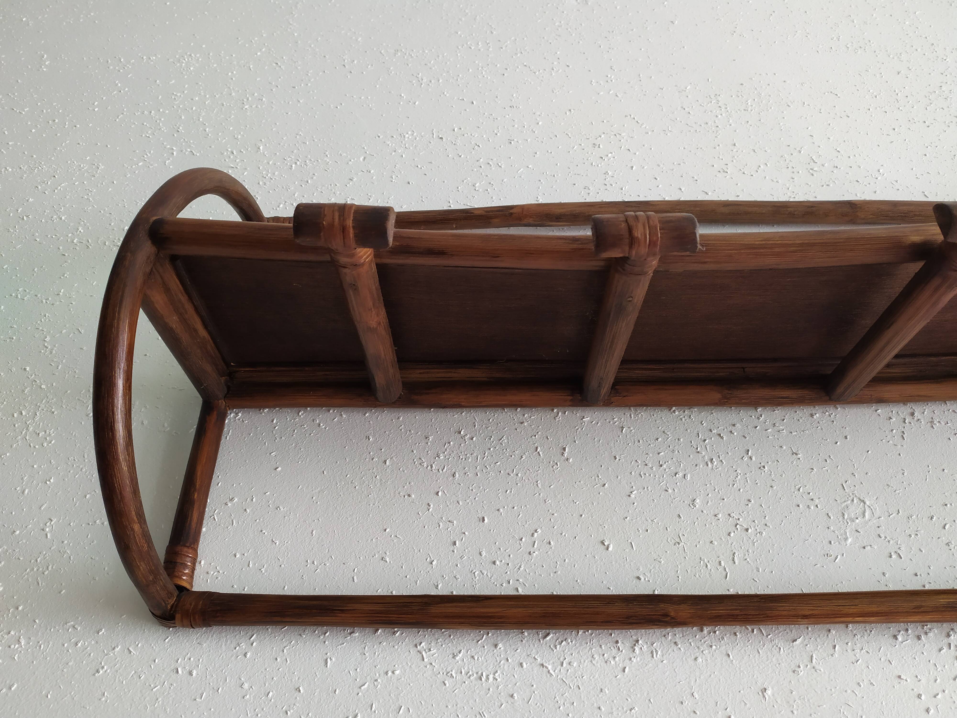Rattan wall coat holder