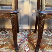 Pair of wide caned armchairs from the Art Nouveau period.