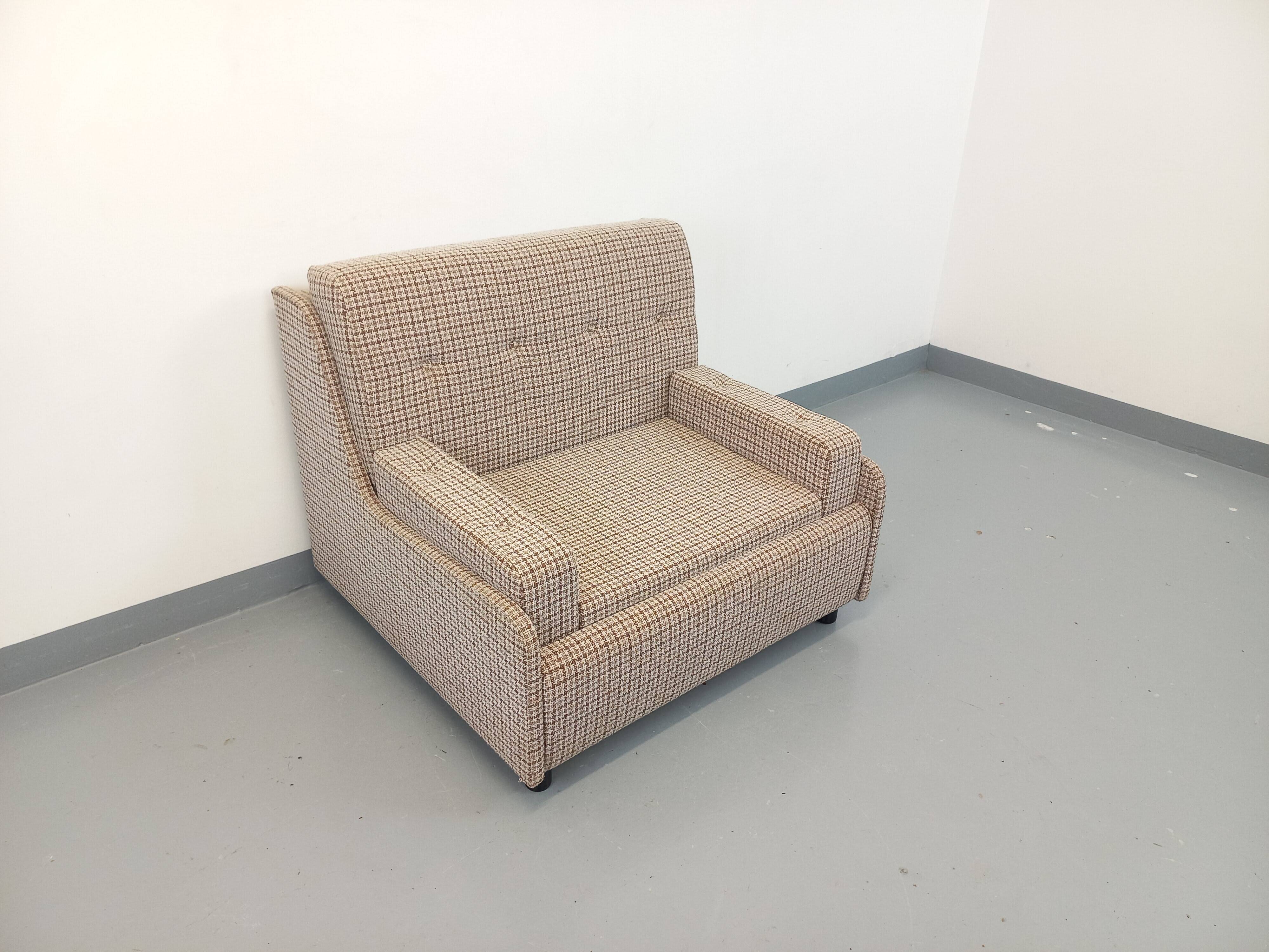 Vintage wool fabric armchair from the 1970s.