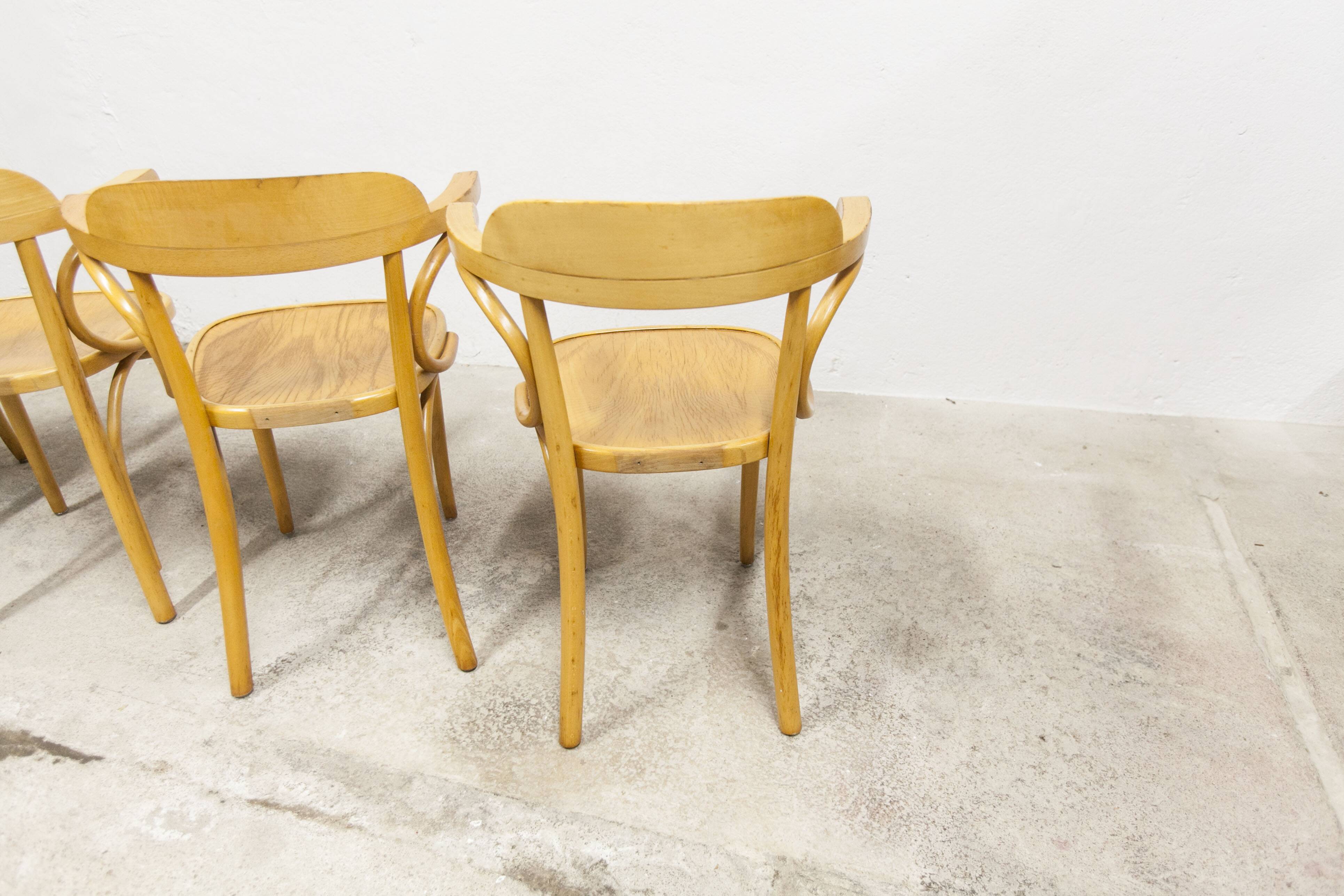 Set of 4 bistro armchairs with armrests from the 1960s.