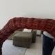 Vintage octagonal mirror in woven rattan.