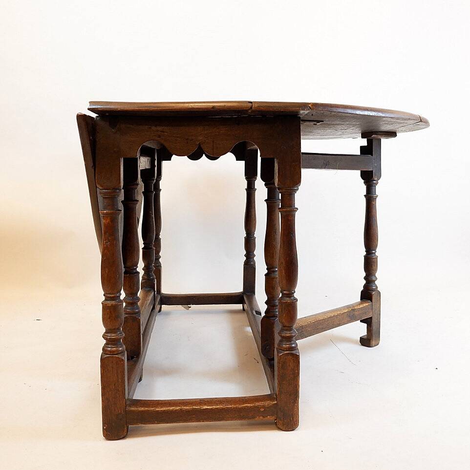 19th century English drop-leaf table with turned legs