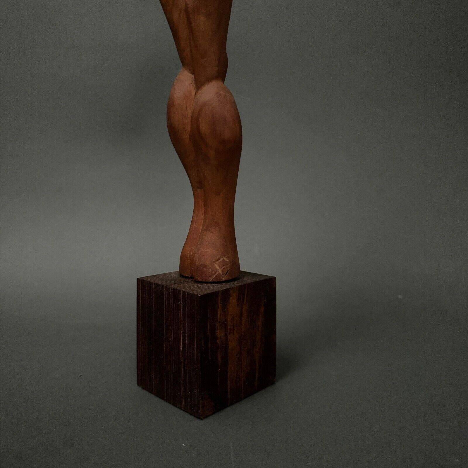 Carved wooden sculpture of a woman by Calin Hentea, 20th century