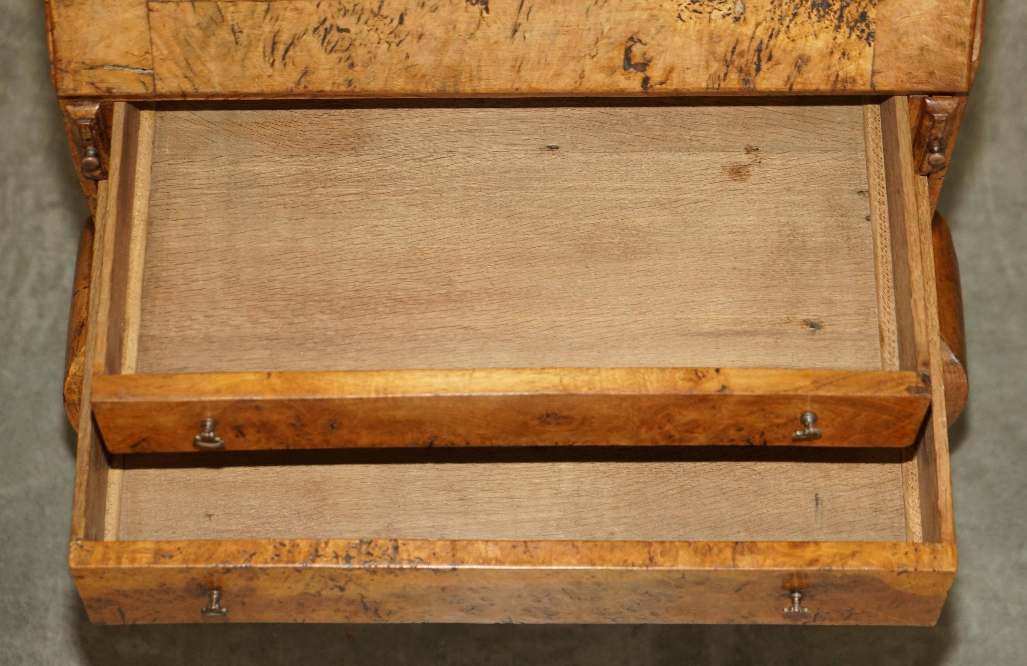 Writing desk in pollard oak from around 1800 with claw and ball carved legs.