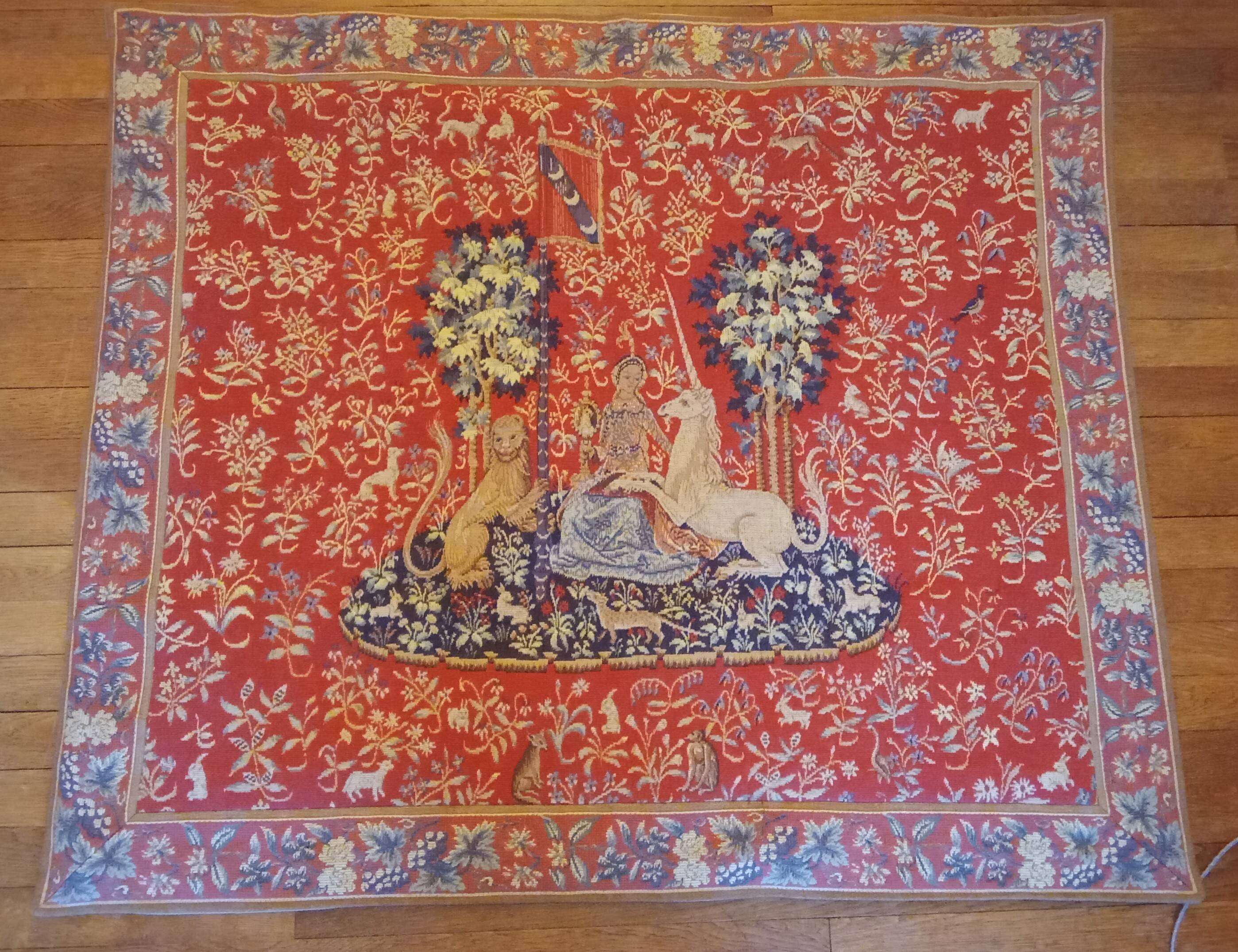 Antique tapestry from Halluin: The Lady and the Unicorn
