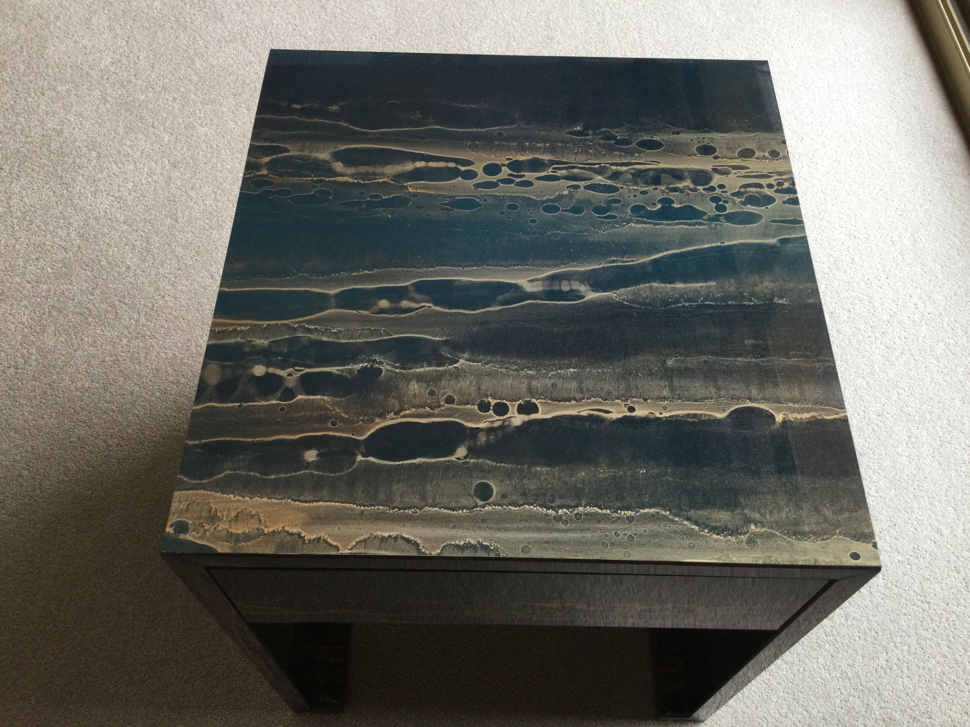 2 bedsides in blue amber hairs are