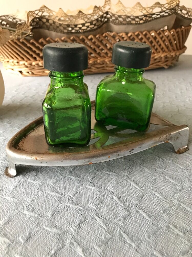 Salt/pepper green glass jars on metal base