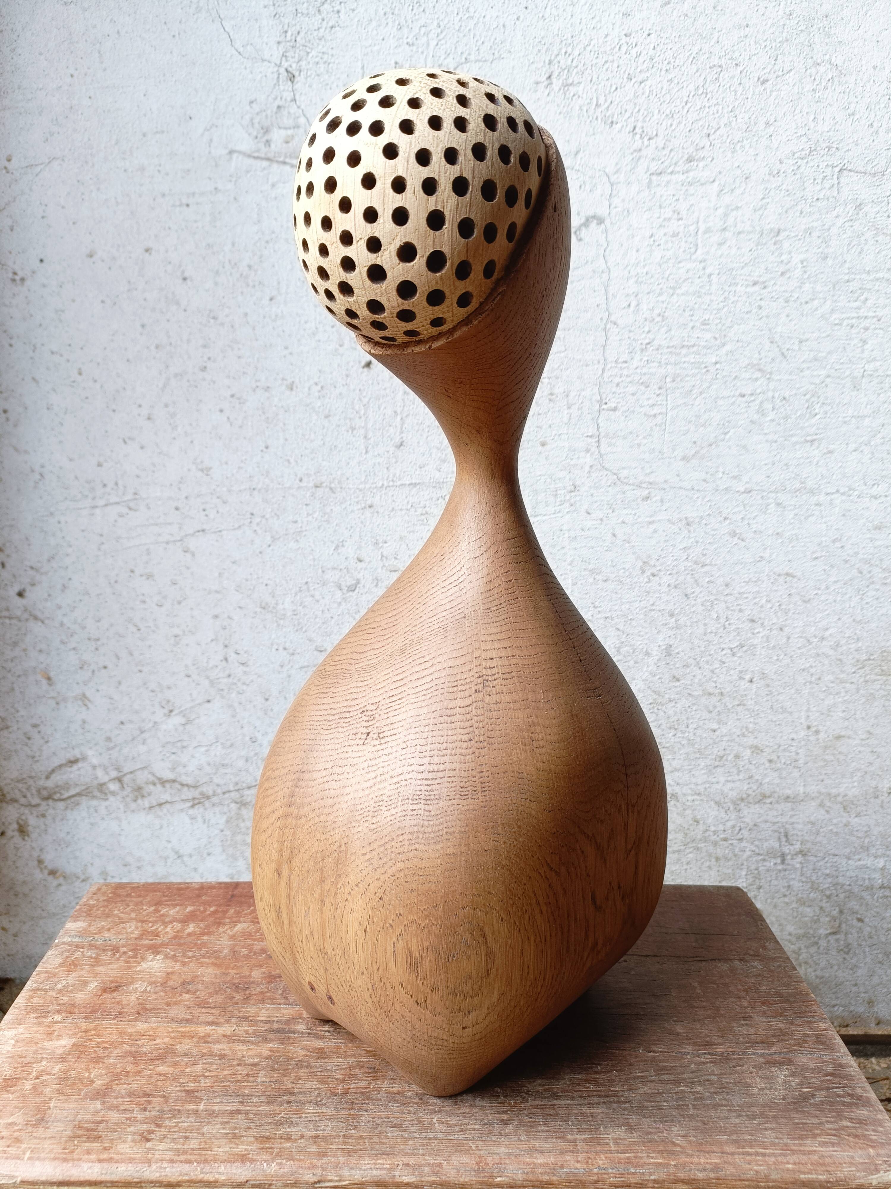 Set of two large solid oak sculptures.