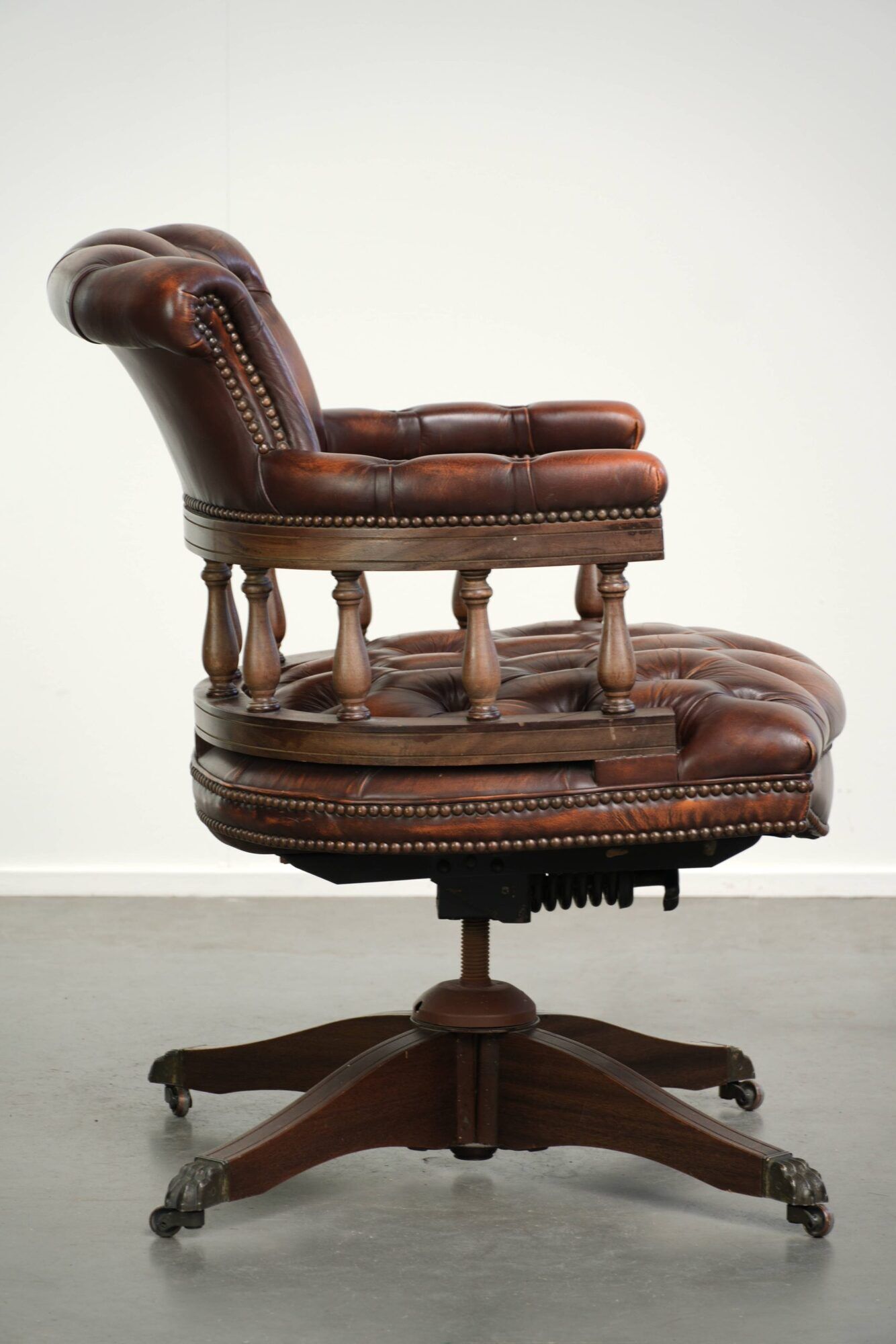English cowhide Chesterfield swivel and tilt button seat office chair