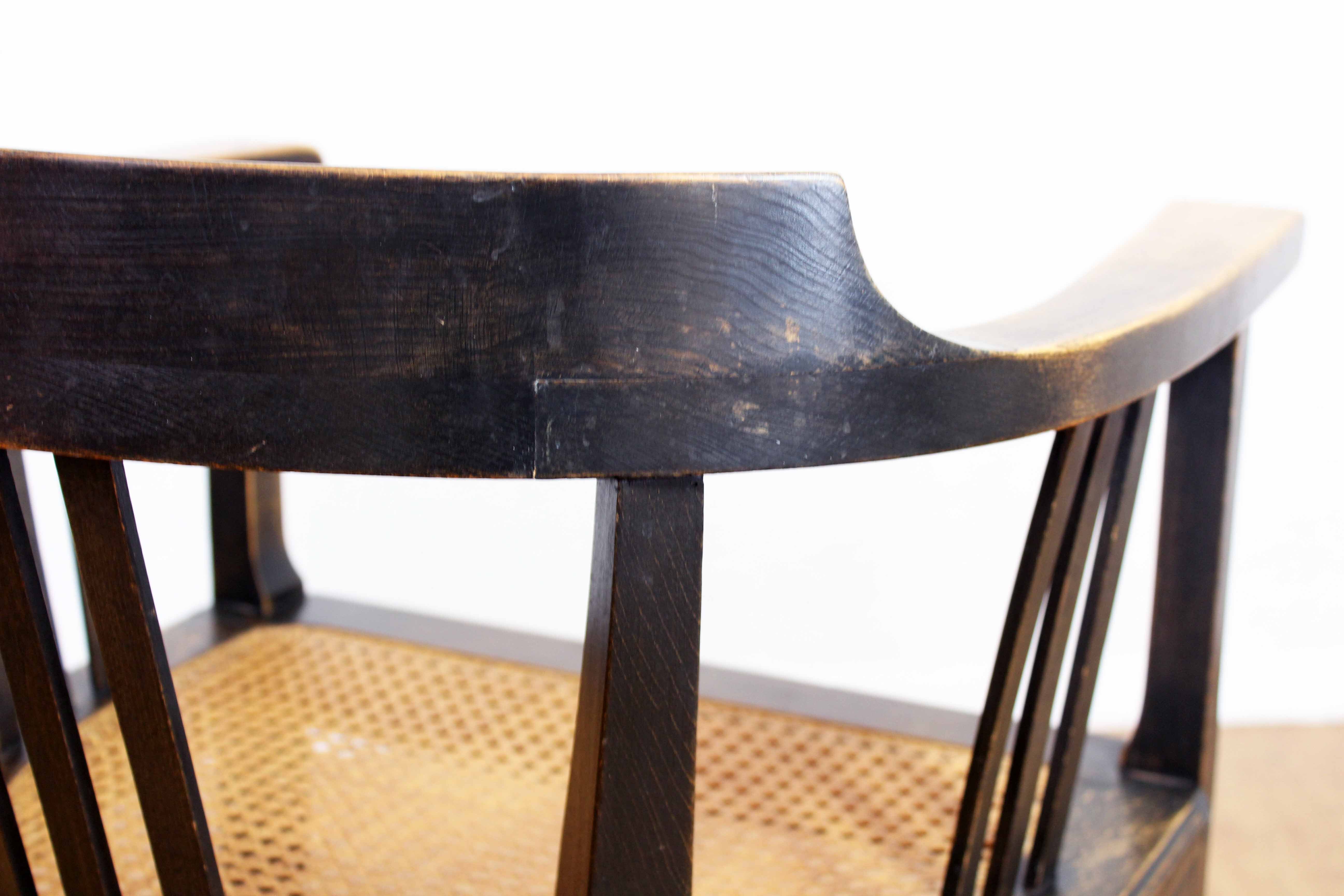 Old chair made of solid wood and caning