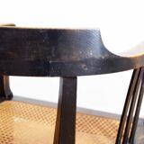 Old chair made of solid wood and caning