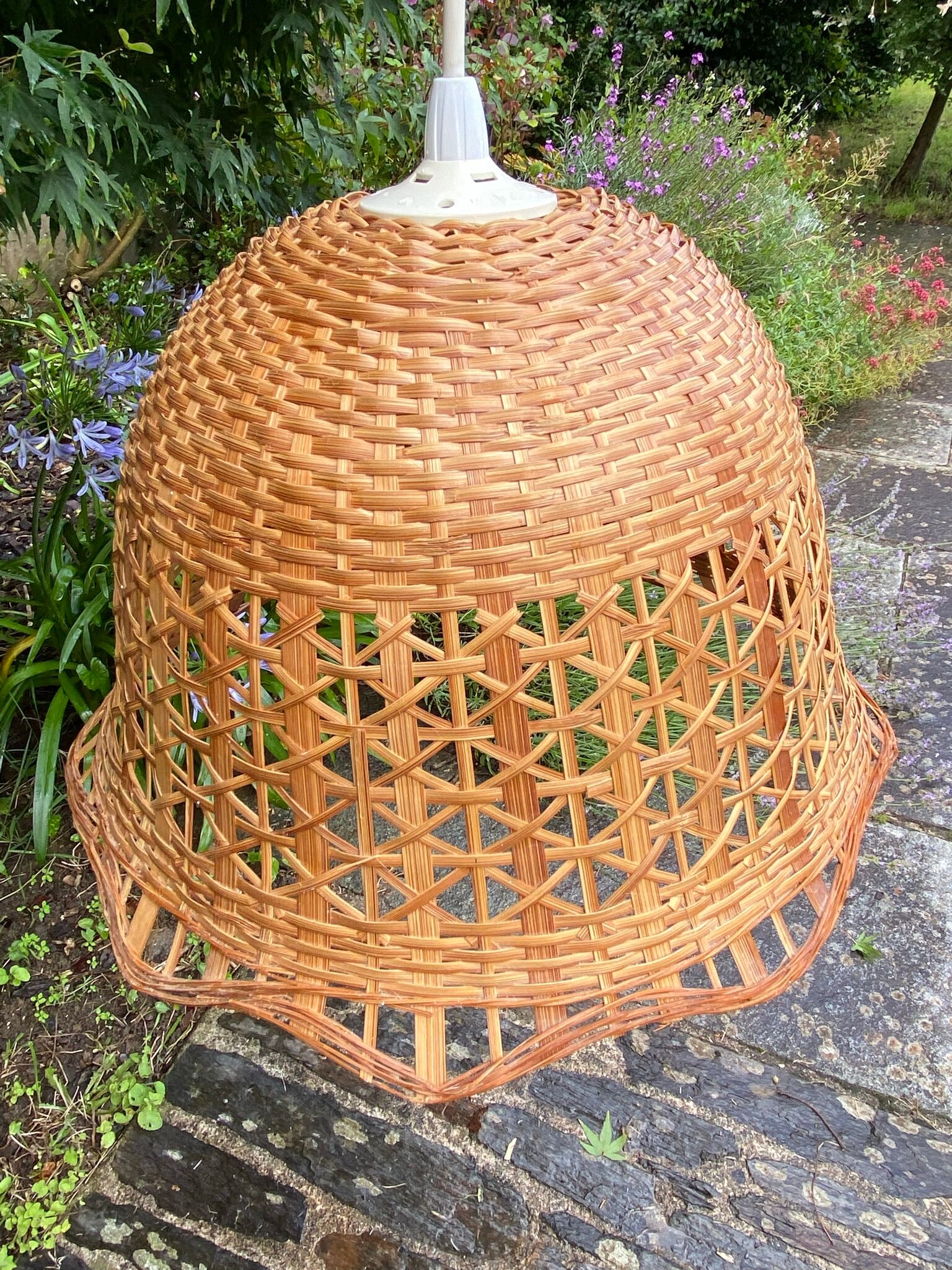 Suspension in rattan and vintage wicker bell shape