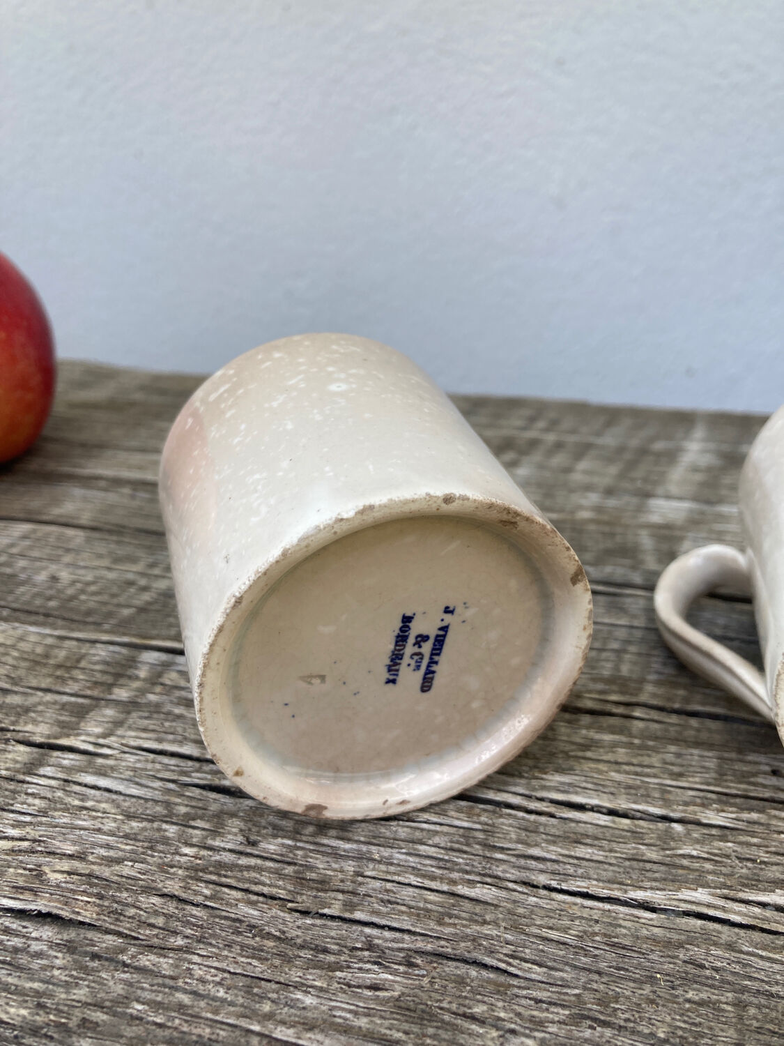 Duo of old beige Veillard Bordeaux coffee cups