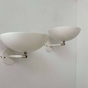 Pair of vintage adjustable wall lights, brass and white metal, France 1970