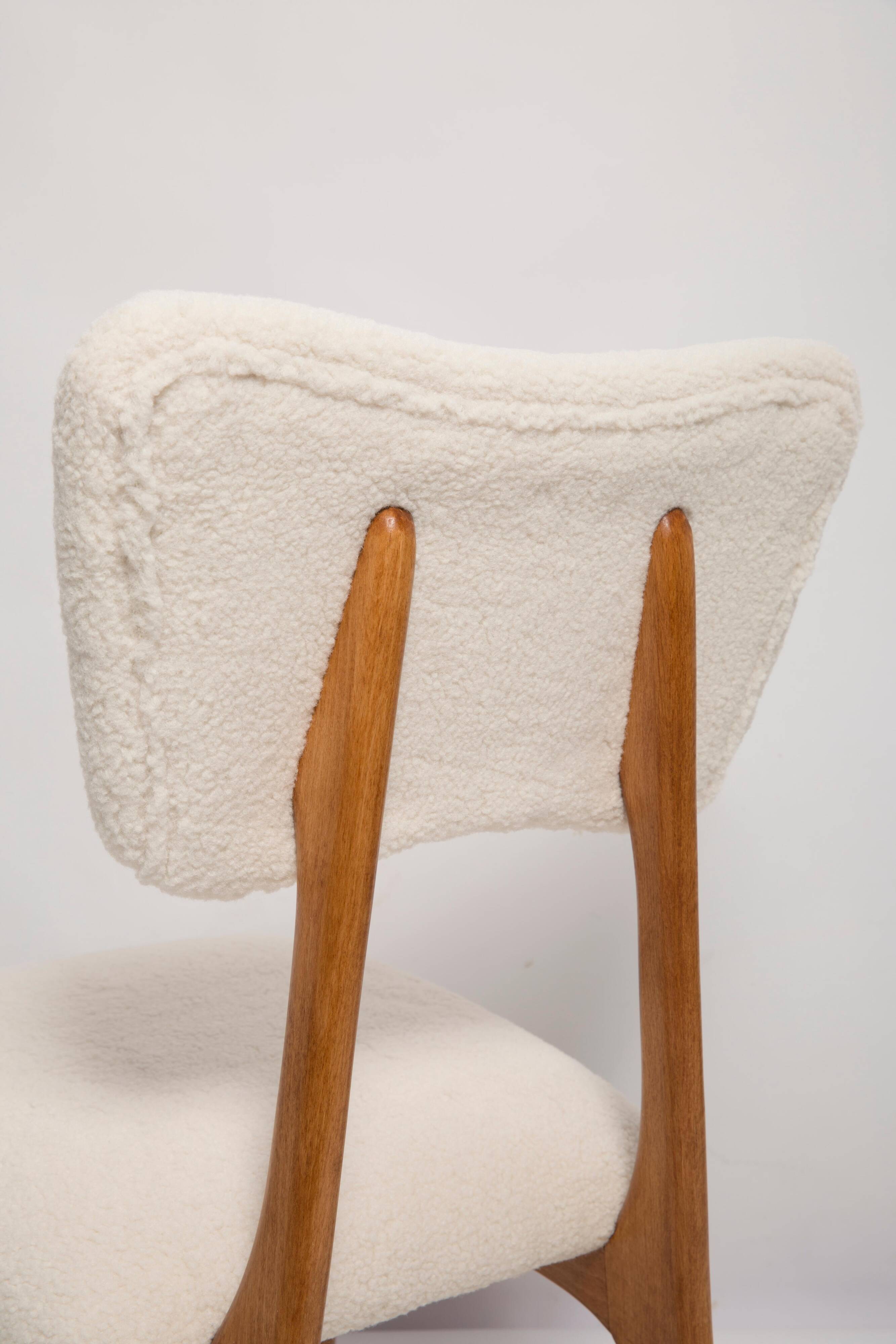 Butterfly chair in beech wood and cream boucle, Europe, 1960