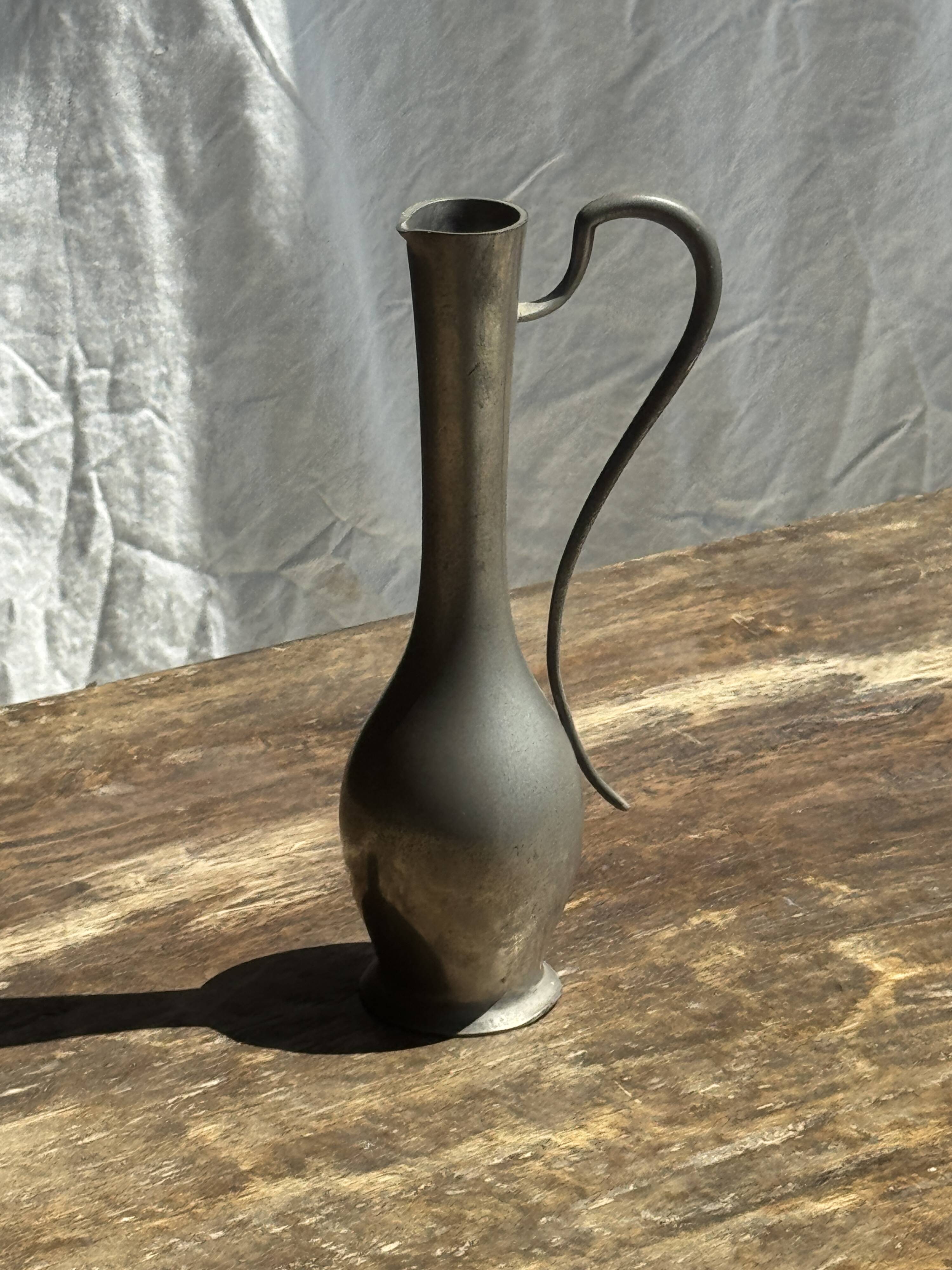 Small 19th century pewter jug, 95% hallmark H20.5