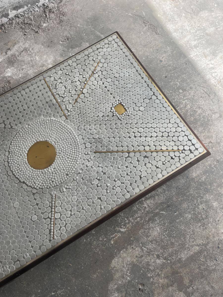 Grey ceramic mosaic top coffee table with dark wood base and brass accents, 1970s
