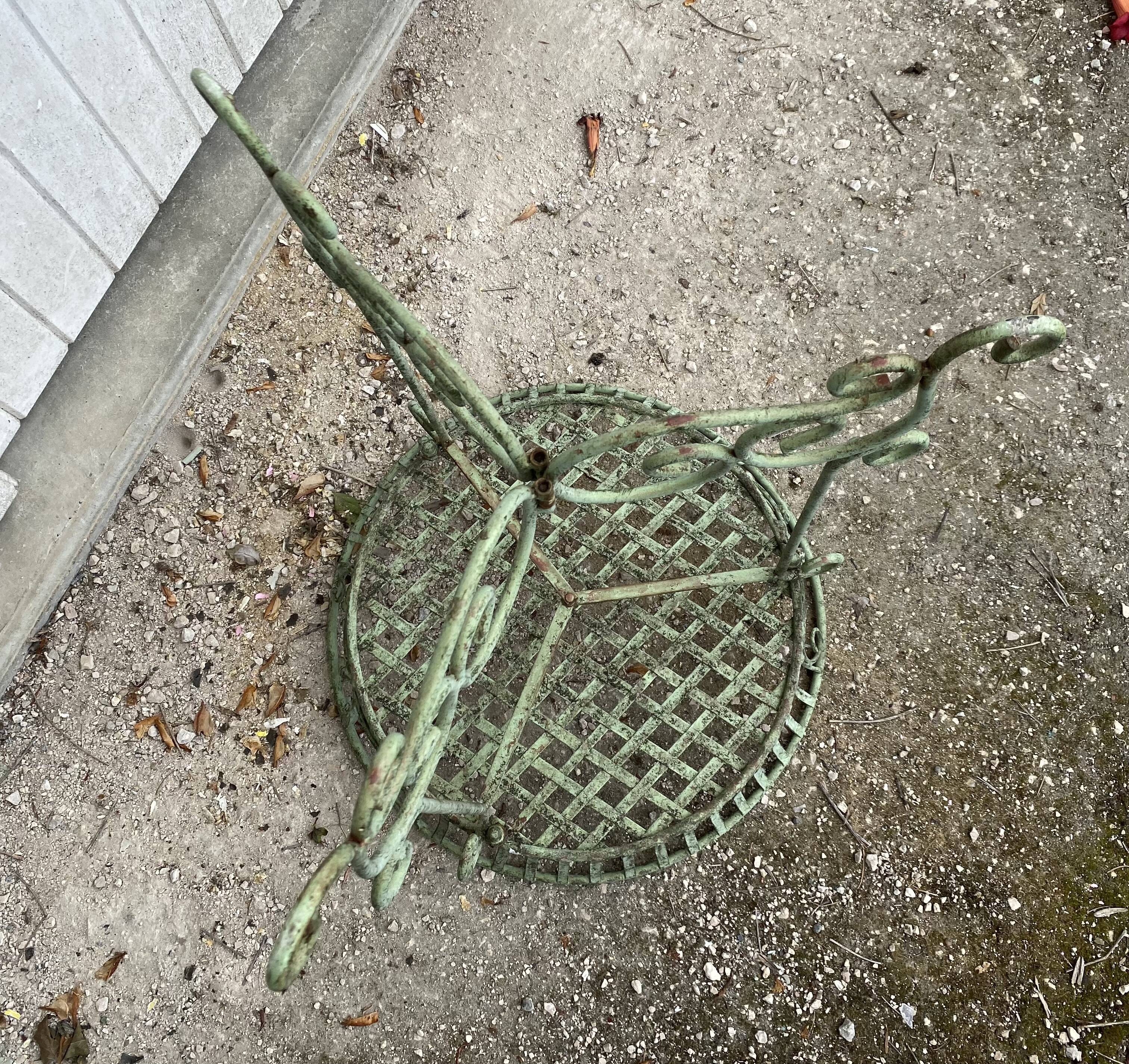 Pedestal cans wrought iron plants