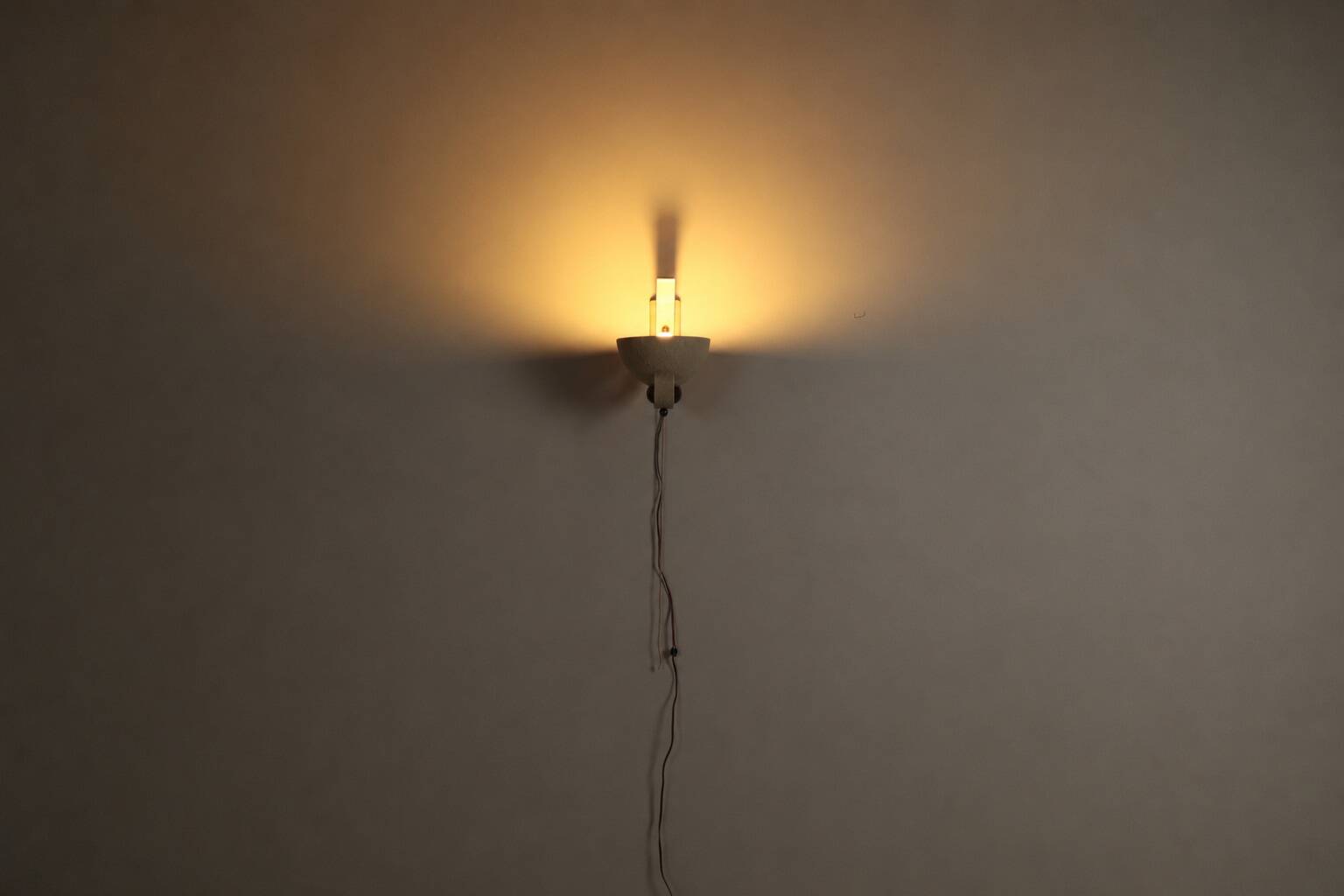 Pair of sculptural mid-century wall uplighters, circa 1950
