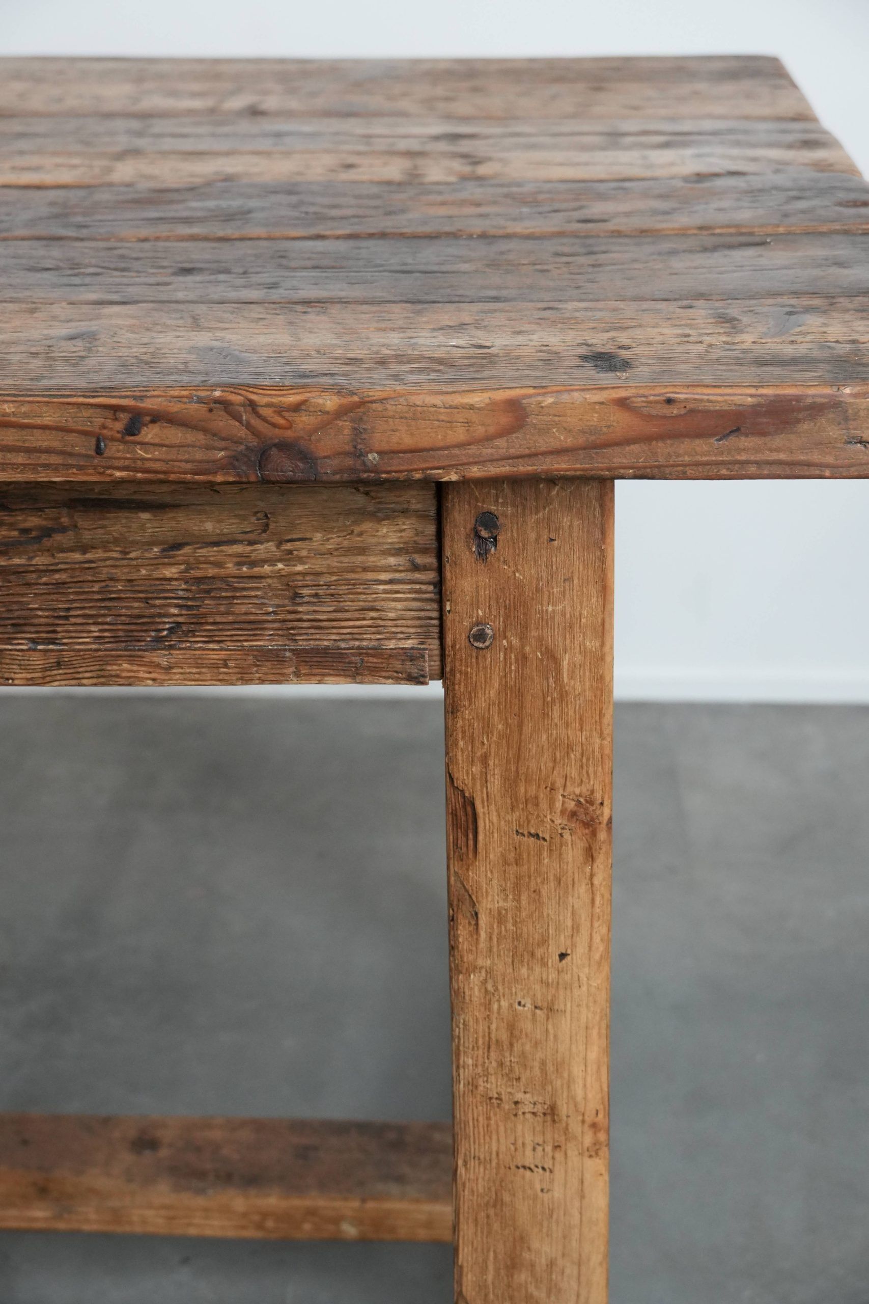 Magnificent and robust antique farmhouse dining table made of pine wood